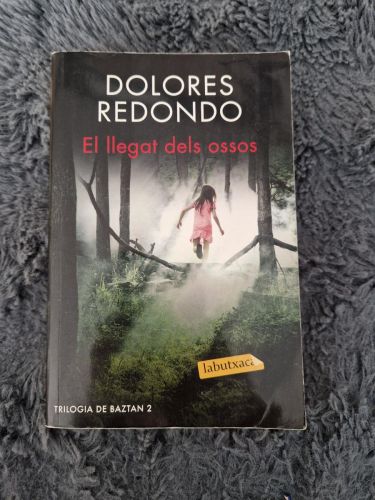 Portada del libro de El Llegat Dels Ossos. 2º Trilogía de Baztan