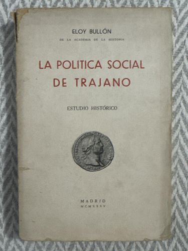 Portada del libro de La política social de Trajano. Con firma y dedicatoria de autor
